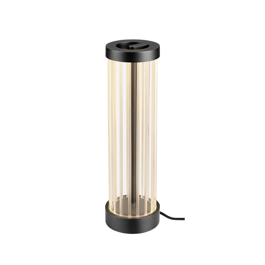 Lampe à poser cylindrique en verre strié, vue de face sur fond blanc.