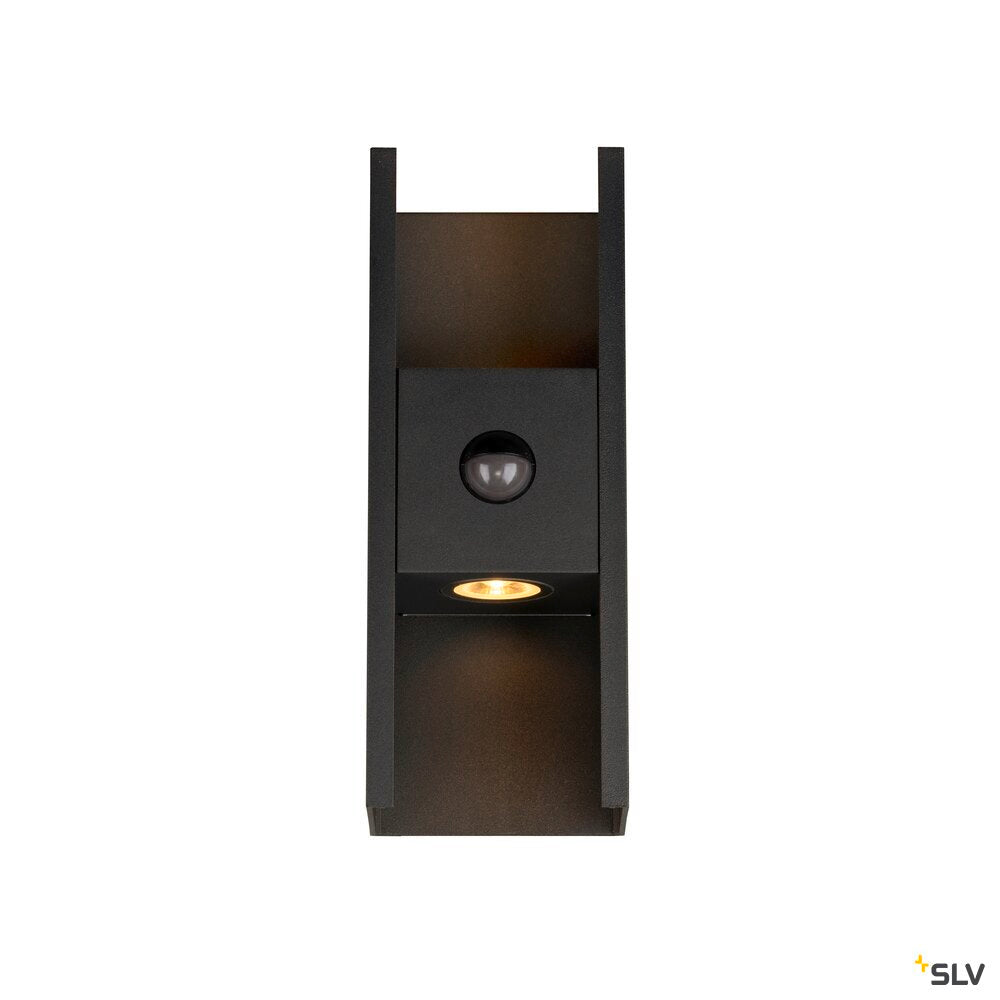 Vue de face du luminaire avec son spot halogène allumé vers le sol