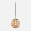 Brass globe pendant light, amber glass for entryway and kitchen | Bollique