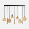 Brass and amber glass pendant light, 9-light bar, dining room | Bollique