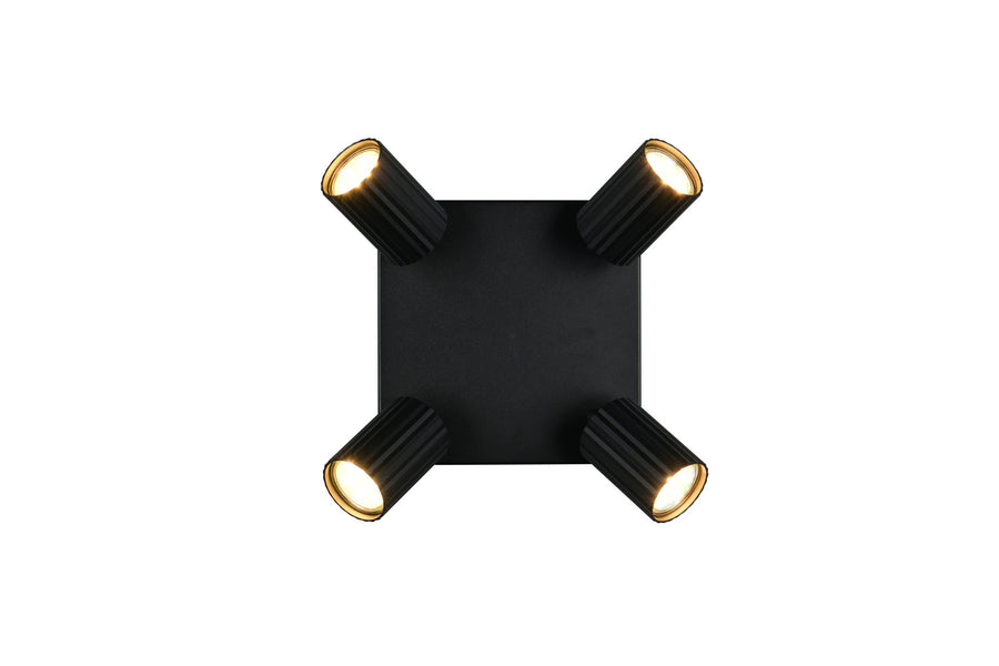 Vue de dessus dévoilant la platine carrée et quatre projecteurs cylindriques disposés en diagonale.