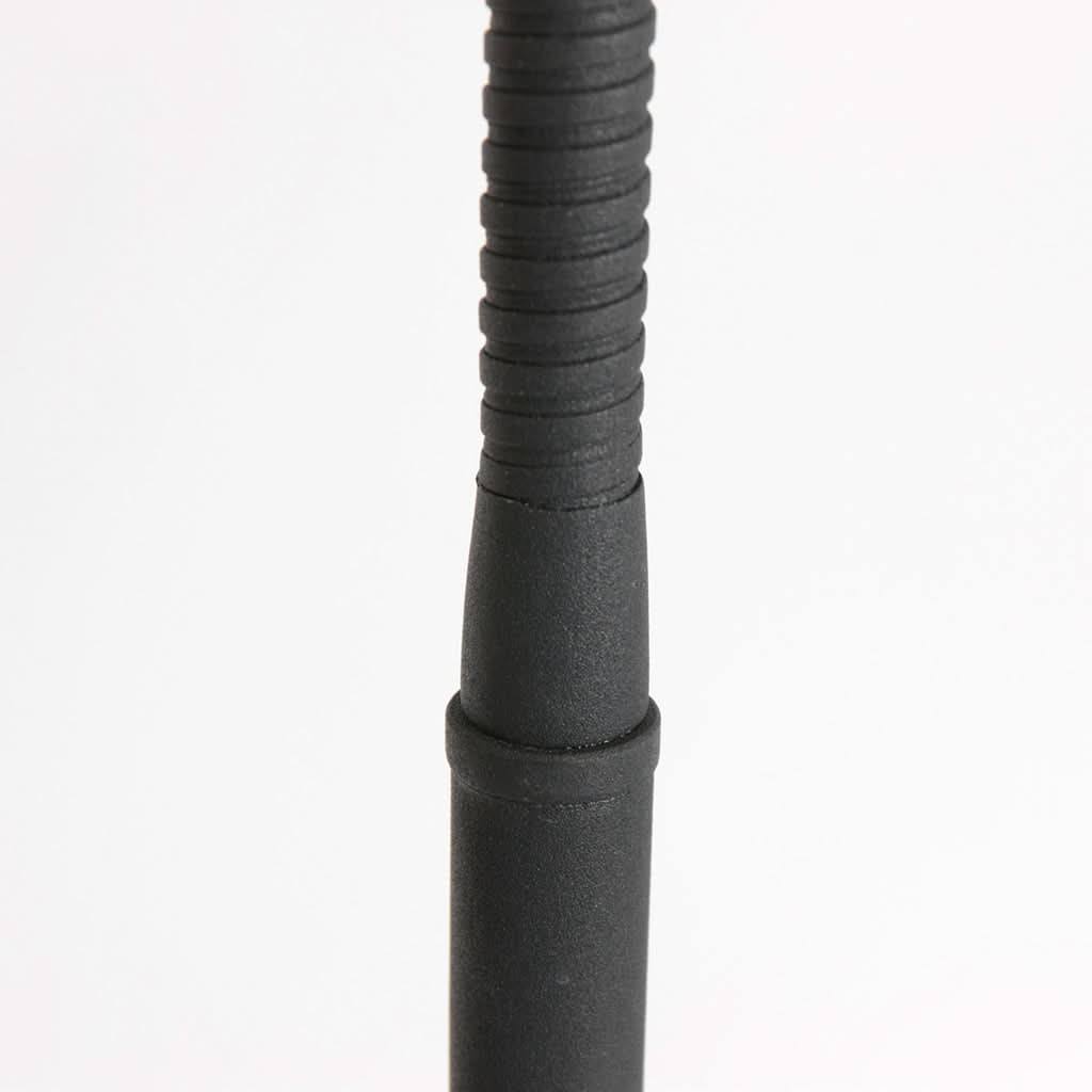 Détail du col flexible strié et de la jonction avec la tige rigide.