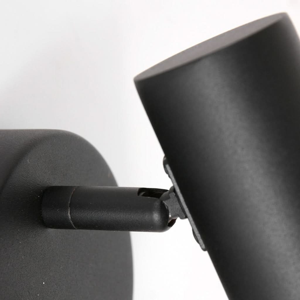 Détail de l'articulation et du bras pivotant en métal noir mat