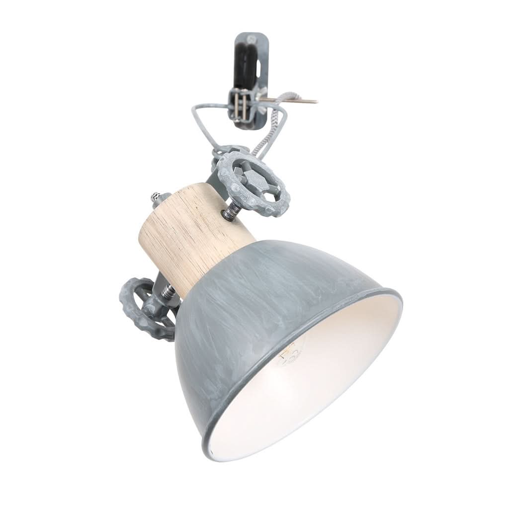 Vue rapprochée du luminaire orientable montrant l'intérieur blanc de l'abat-jour conique.