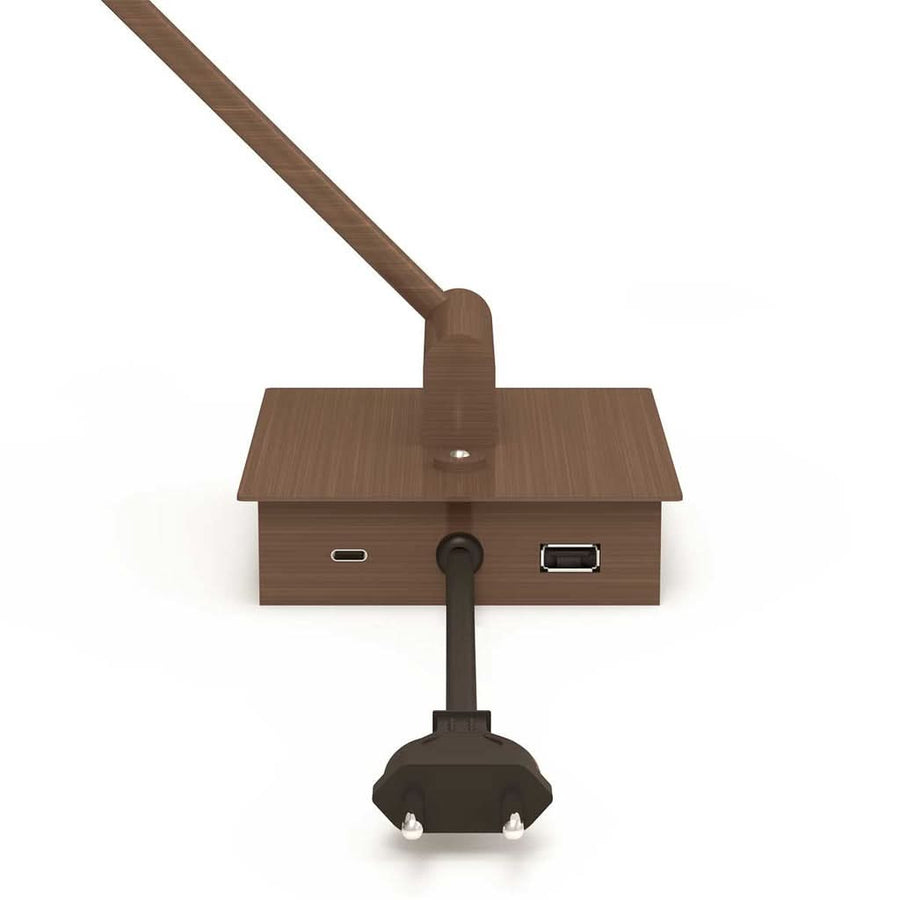 Deux ports USB intégrés (USB-A et USB-C) sous la platine de l'applique murale Retina