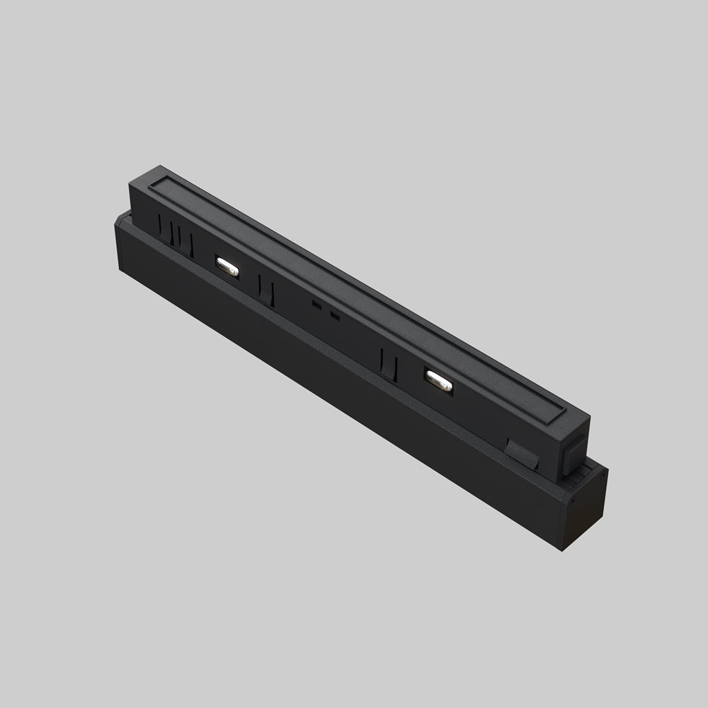 Vue arrière du module noir montrant raccords et connecteurs techniques